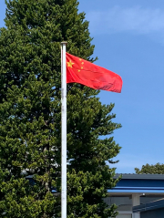 Raising The Chinese Flag